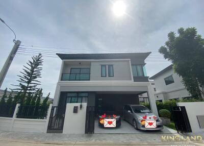 Front view of a two-story house with a garage