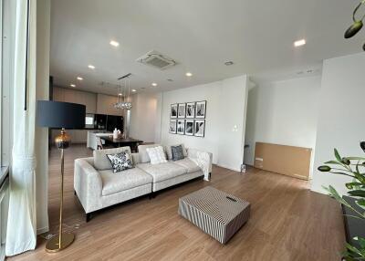 Modern open-plan living room with kitchen