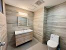 Modern bathroom with wood-like tile walls and vanity