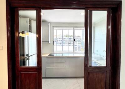 Modern kitchen with wooden sliding doors