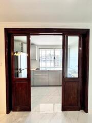 Modern kitchen with wooden sliding doors