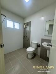 Modern bathroom with shower, toilet, and sink