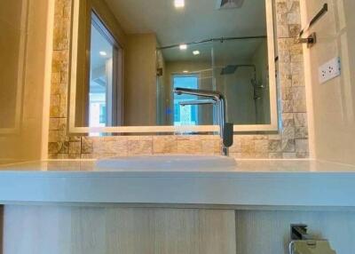 Modern bathroom with large mirror and sink