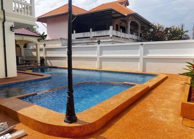 Outdoor swimming pool area of the property