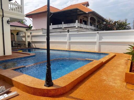 Outdoor swimming pool area of the property