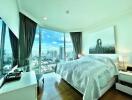 Modern main bedroom with large windows and city view