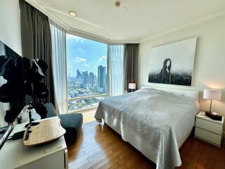 Modern bedroom with large window view