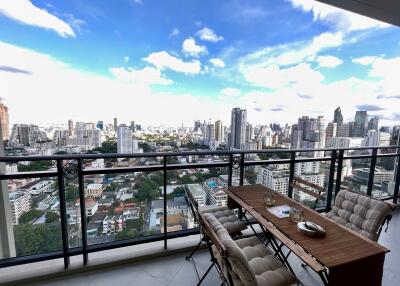 High-rise balcony with city skyline view