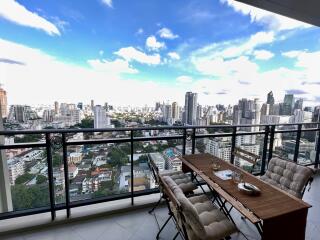 High-rise balcony with city skyline view