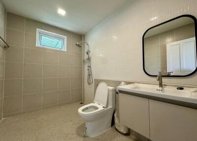 Modern bathroom with toilet and shower