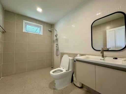 Modern bathroom with toilet and shower