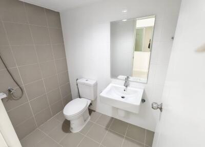 Modern bathroom with sink, toilet and shower