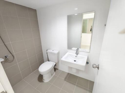 Modern bathroom with sink, toilet and shower