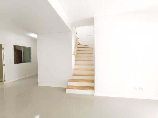 Modern white staircase in a bright home