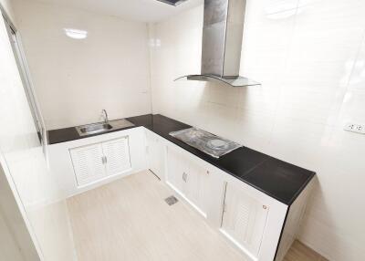 Modern kitchen with a built-in stove and sink