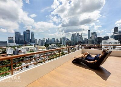 Newly Renovated 2-Bedroom Condo with Large Balcony and BTS Phloen Chit View