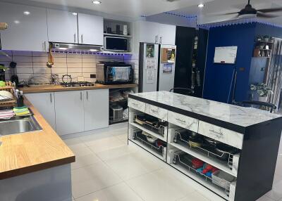 Modern kitchen with island and appliances