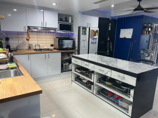 Modern kitchen with island and appliances