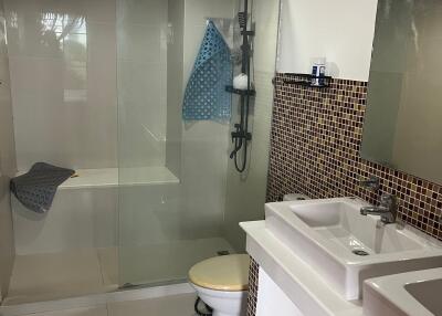 Modern bathroom with glass shower enclosure