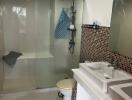 Modern bathroom with glass shower enclosure