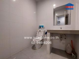 Simple bathroom with toilet and sink