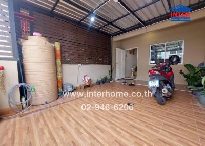 Covered outdoor area with motorbike