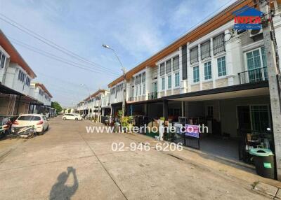 Residential row houses with a clear blue sky