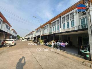 Residential row houses with a clear blue sky