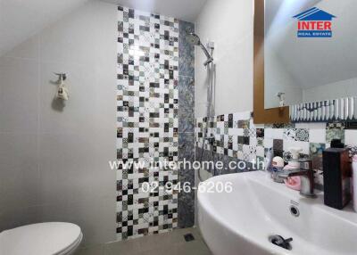 Modern bathroom with mosaic tile design