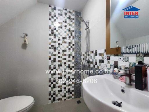 Modern bathroom with mosaic tile design