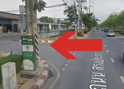 Street view with traffic signs and taxi stand