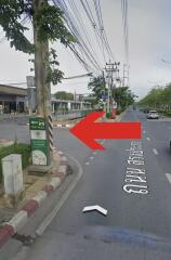 Street view with traffic signs and taxi stand