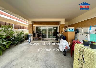 Garage area with storage and plants