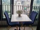 Small dining area with a city view