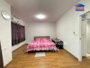 Modern bedroom with wooden floor and purple curtains