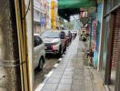 Street view with cars and sidewalk