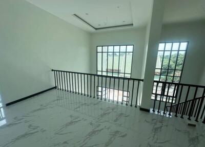 Bright and spacious hallway with large windows