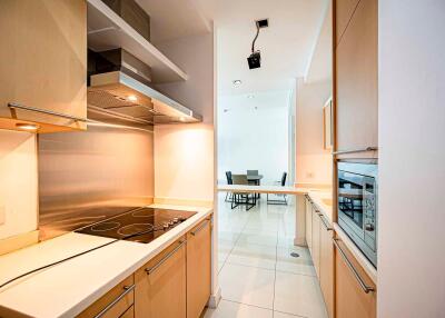 Modern kitchen with dining area in view