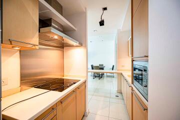 Modern kitchen with dining area in view