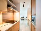 Modern kitchen with dining area in view