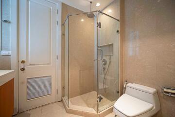 Modern bathroom with glass shower and toilet