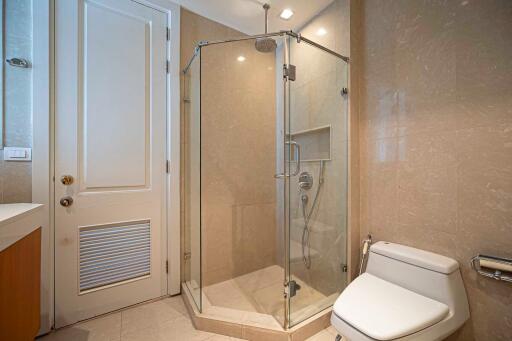 Modern bathroom with glass shower and toilet