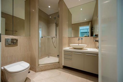 Modern bathroom with glass shower and vanity