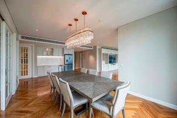 Modern dining area with a chandelier