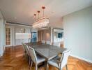 Modern dining area with a chandelier