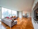 Modern living room with large windows and city view