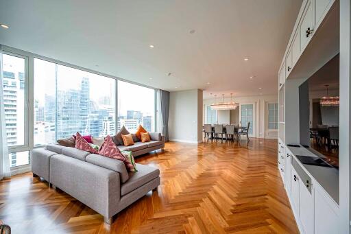 Modern living room with large windows and city view