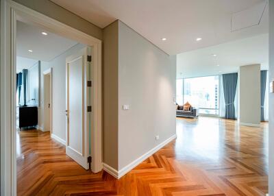 Bright and spacious main living area with hardwood floors