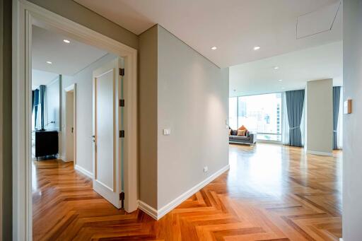 Bright and spacious main living area with hardwood floors