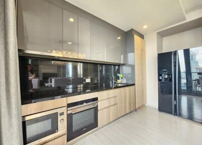 Modern kitchen with built-in appliances and ample counter space